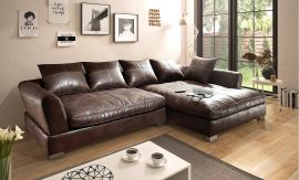 Sogno-sohva puisilla jaloilla ja kauniilla tikkauksilla